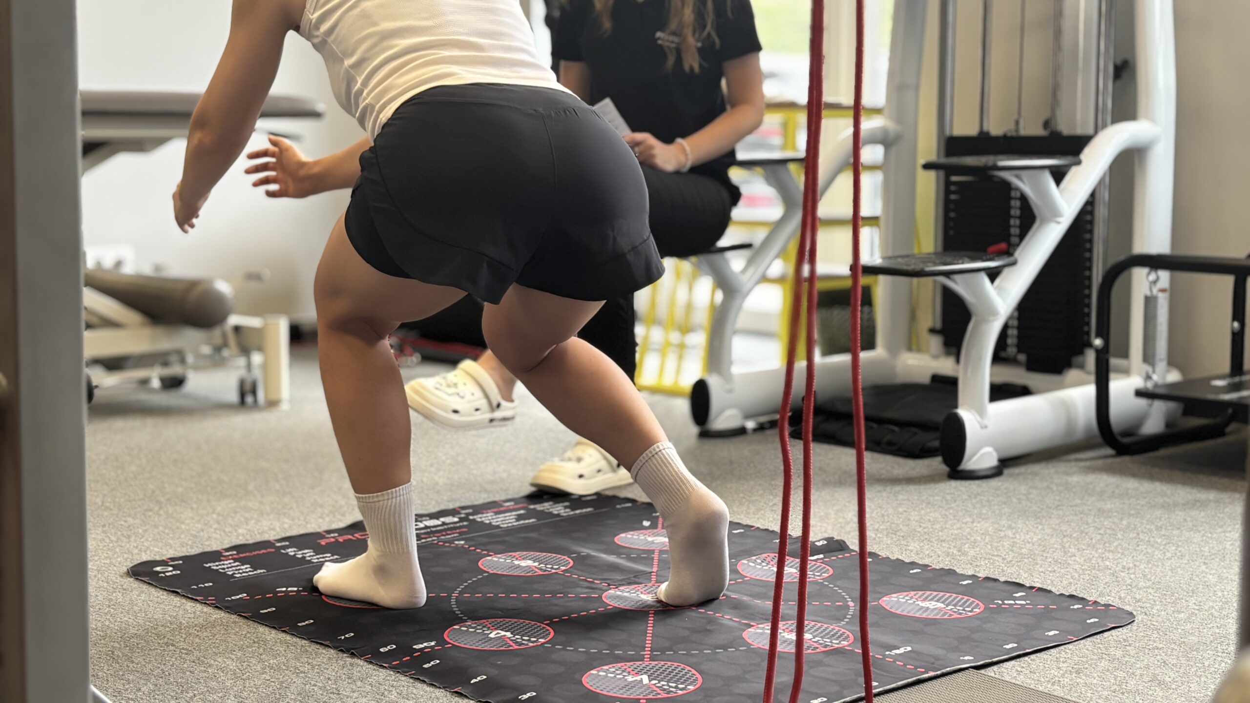 Training on a special mat with an instructor to improve physical fitness and coordination.